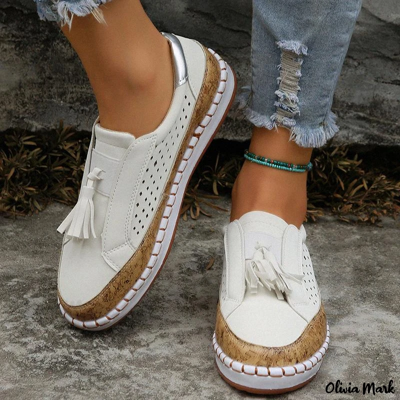 Tassel Loafers: modische Slipper mit niedrigem Absatz