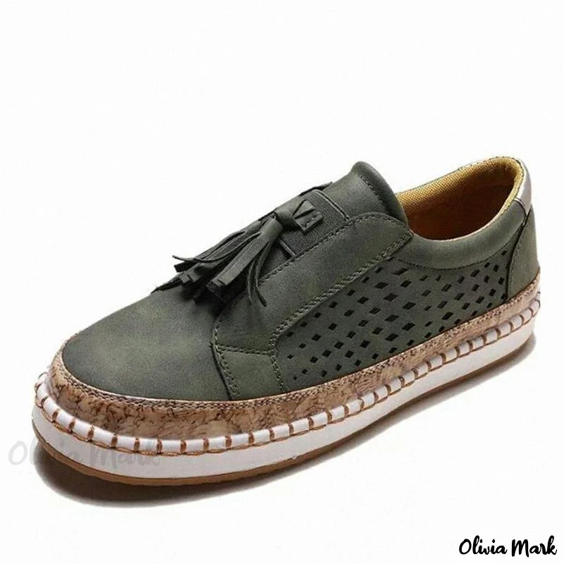 Tassel Loafers: modische Slipper mit niedrigem Absatz