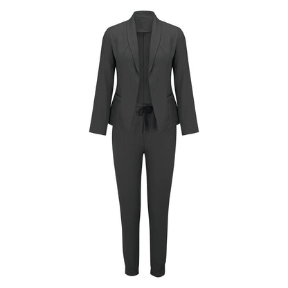 Damen-Jogginganzug in Blau, bestehend aus Jacke und Hose, ideal für Freizeit und Sport. Bequeme Passform, modisch und vielseitig einsetzbar.