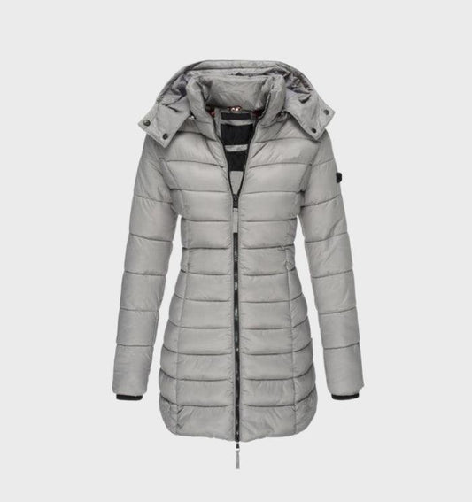Damen Winterjacke, grau, mit Kapuze und Reißverschluss. Leicht, warm, ideal für kalte Tage. Perfekt für stilvolle Wintermode.